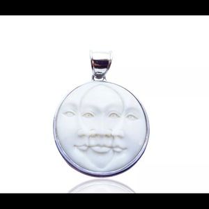 Carved Moon Face Pendant